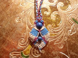 Macramé-Cavandoli pendant with semi-precious beads